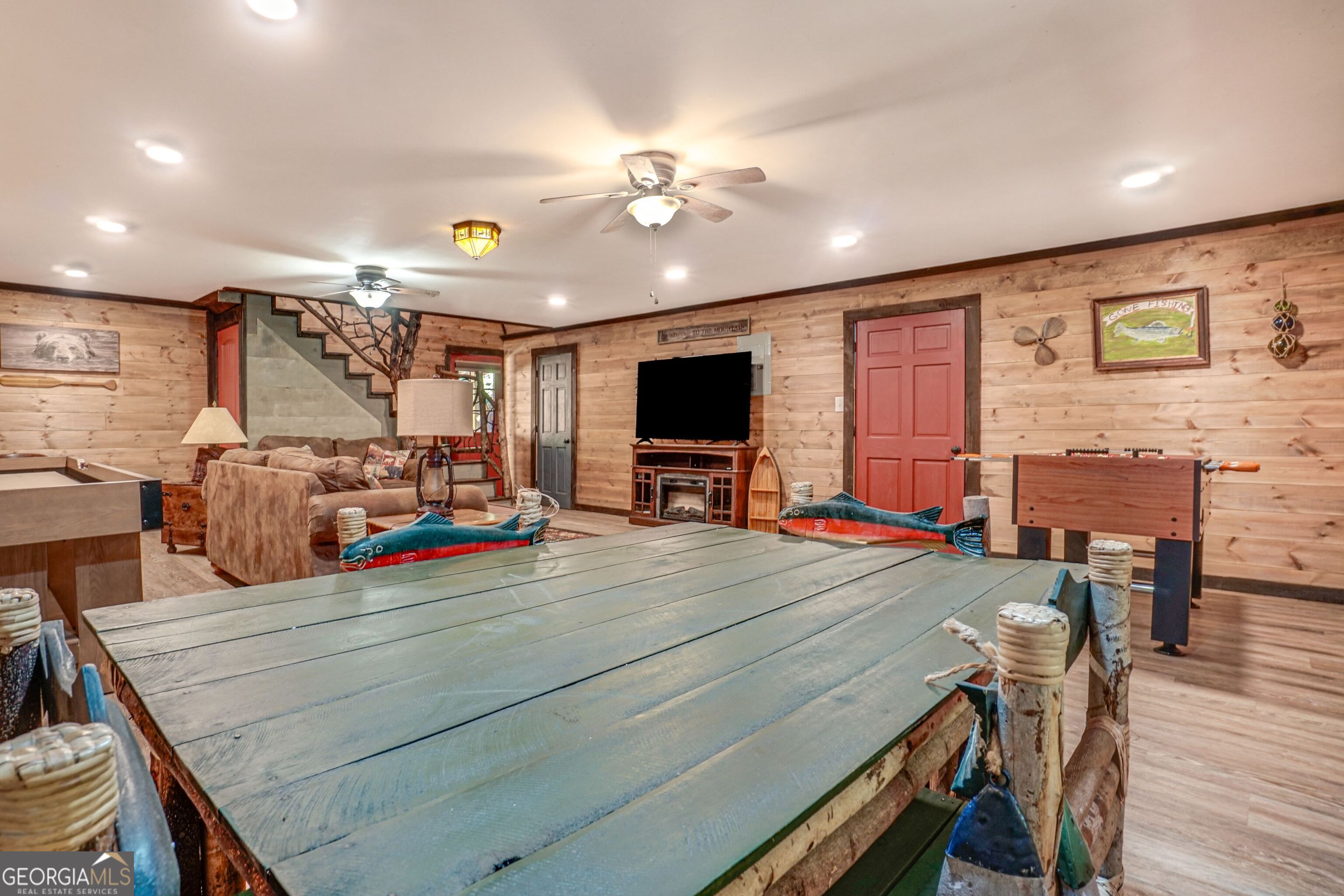 2183 Chimney Mountain Road Sautee Nacoochee, GA 30571 - Photo 14 of 28 a view of a livingroom with furniture and a flat screen tv