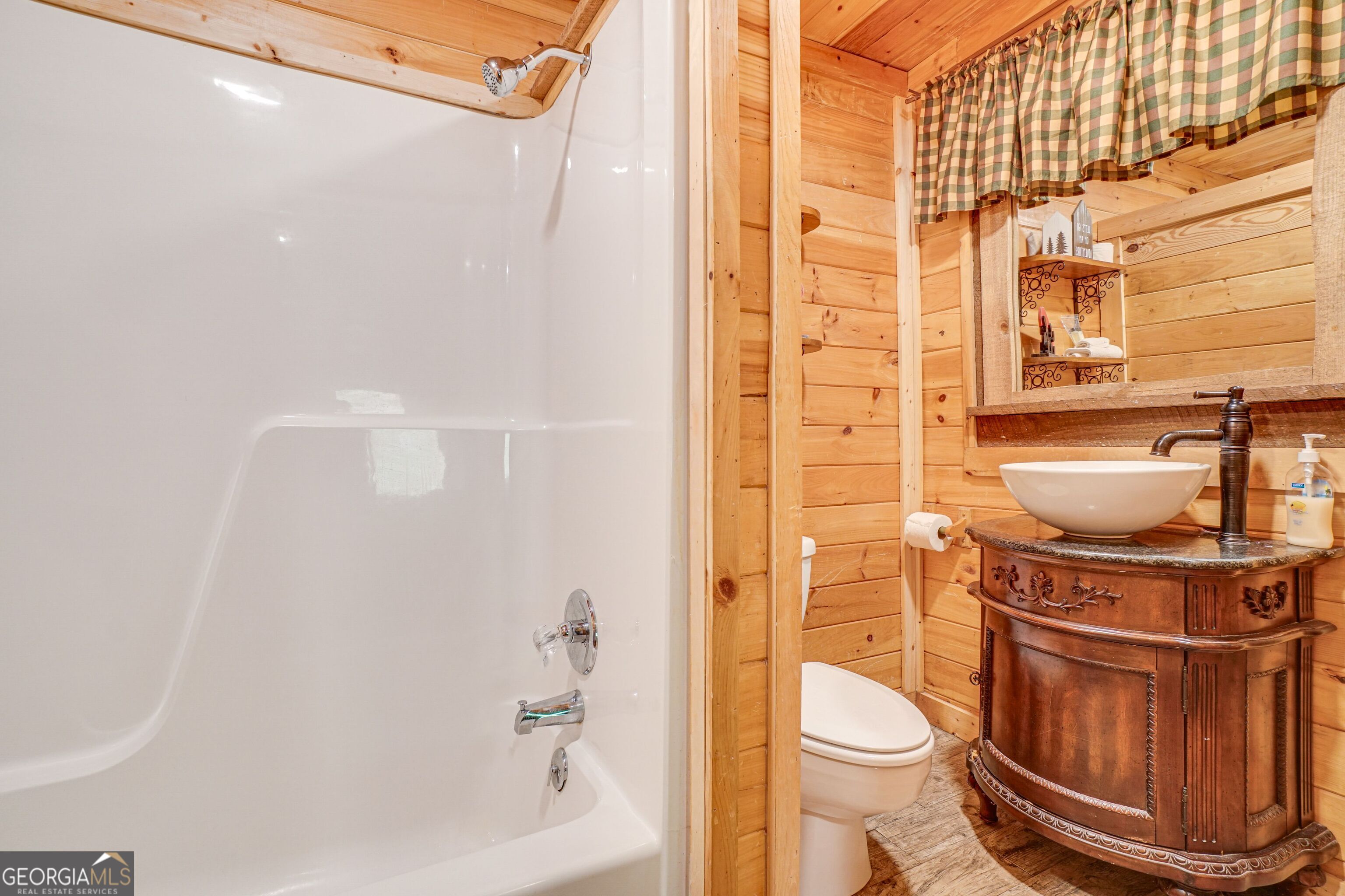 2183 Chimney Mountain Road Sautee Nacoochee, GA 30571 - Photo 20 of 28 a bathroom with a toilet and a shower