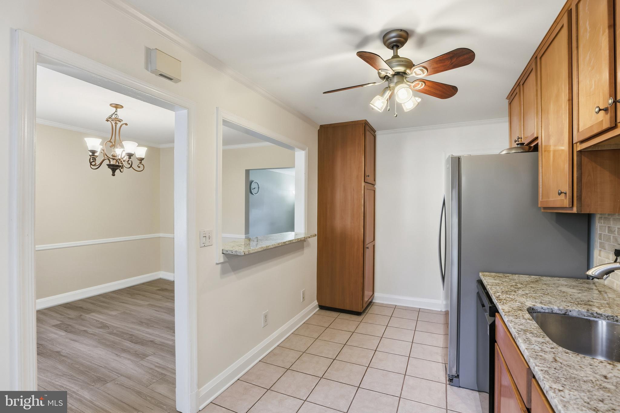 1002 Winsford Road Baltimore, MD 21204 - Photo 11 of 30 a view of a kitchen with a sink and cabinet