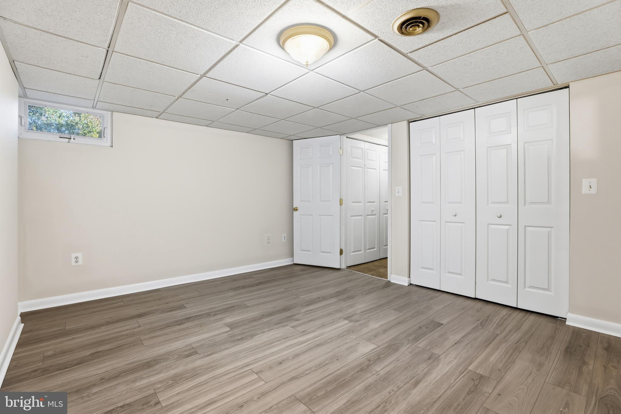 1002 Winsford Road Baltimore, MD 21204 - Photo 22 of 30 a view of a room with wooden floor