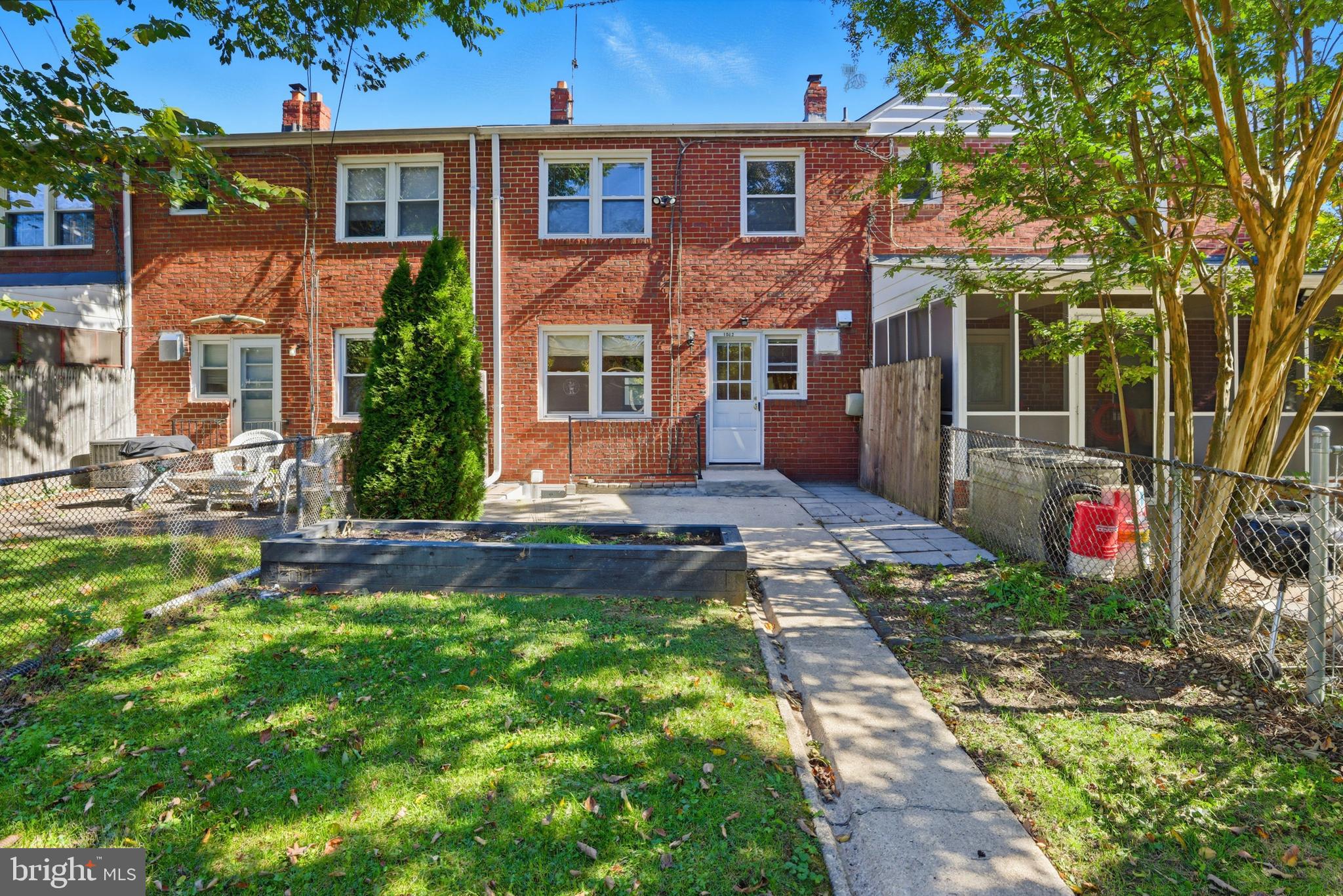1002 Winsford Road Baltimore, MD 21204 - Photo 30 of 30 a front view of a house with garden