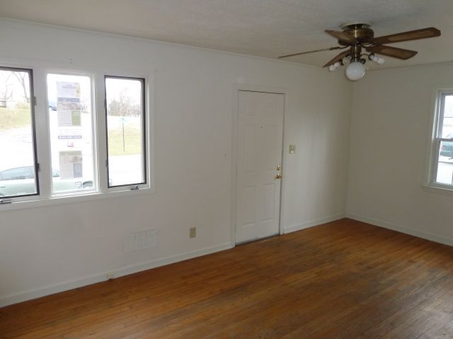 2203 Courtland Road Northeast Roanoke, VA 24012 - Photo 4 of 10 an empty room with a window