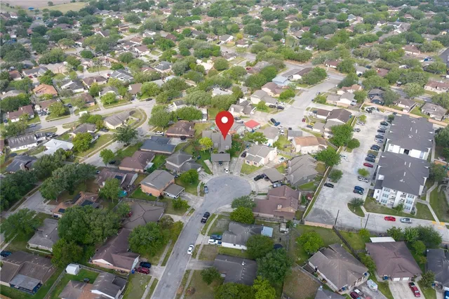 an aerial view of house with yard