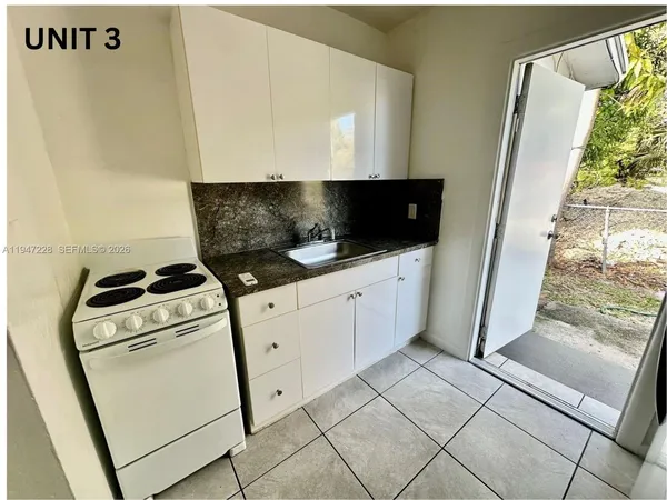 a bathroom with a toilet and a bathtub