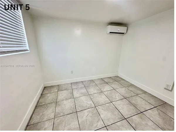 a bathroom with a sink and shower