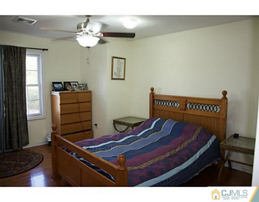9 Halstead Road New Brunswick, NJ 08901 - Photo 14 of 24 a living room with furniture