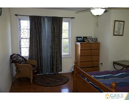 9 Halstead Road New Brunswick, NJ 08901 - Photo 15 of 24 a living room with furniture and a window