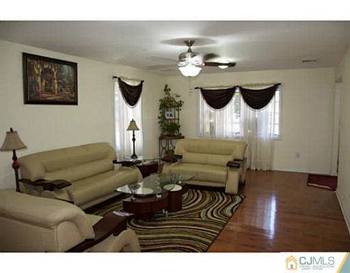 9 Halstead Road New Brunswick, NJ 08901 - Photo 4 of 24 a living room with furniture