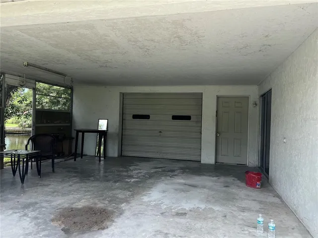 a view of a hallway with seating area