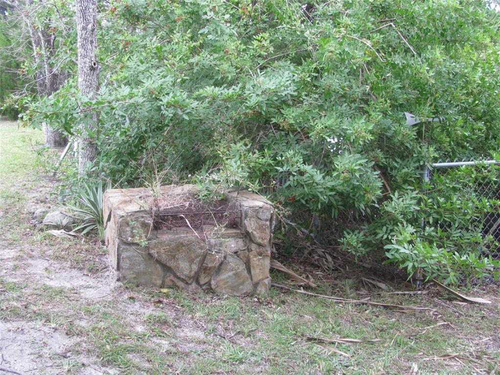 14830 Atlantic Avenue Hudson, FL 34667 - Photo 20 of 26 a view of backyard with outdoor space