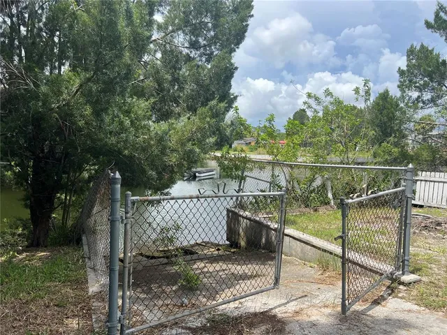a view of a wrought iron fences in front of house