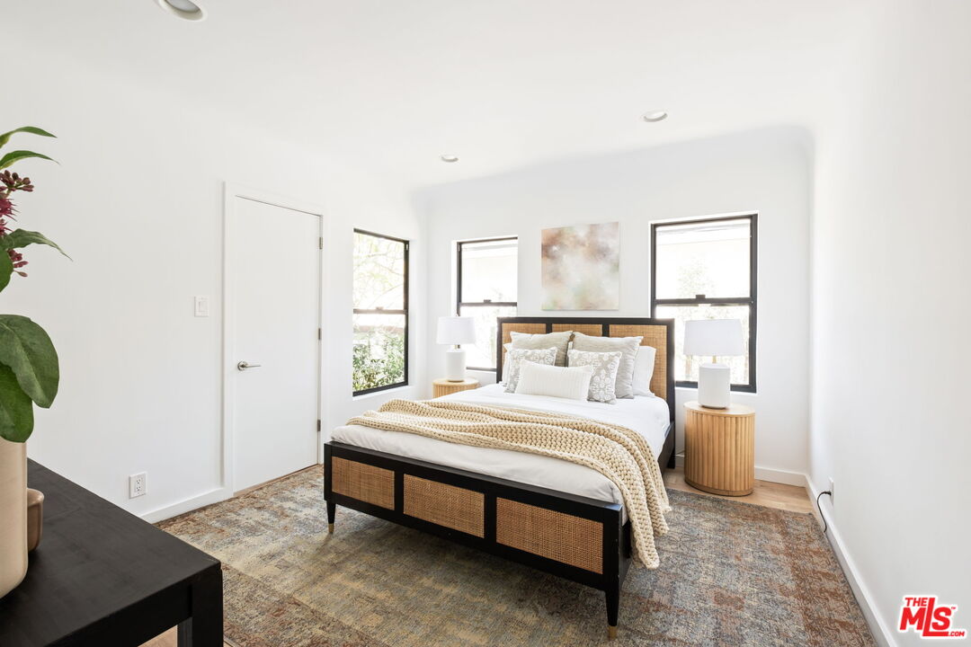 3414 Ferncroft Road Los Angeles, CA 90039 - Photo 16 of 47 a bedroom with a bed and window