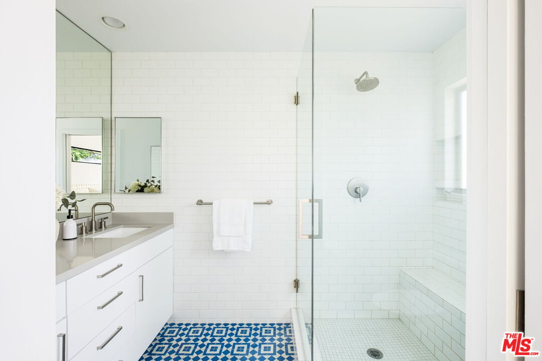 3414 Ferncroft Road Los Angeles, CA 90039 - Photo 25 of 47 a bathroom with a shower sink and mirror