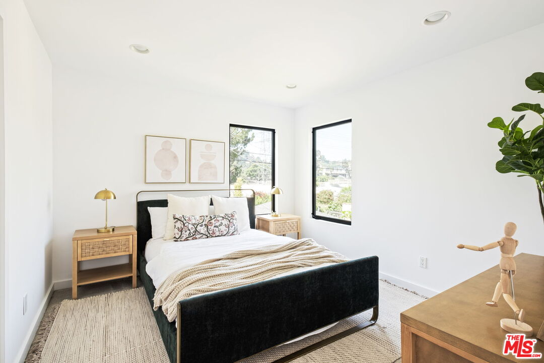 3414 Ferncroft Road Los Angeles, CA 90039 - Photo 26 of 47 a bedroom with a bed and a window