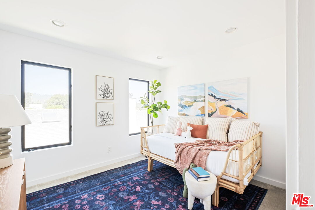 3414 Ferncroft Road Los Angeles, CA 90039 - Photo 27 of 47 a bedroom with a bed and a window