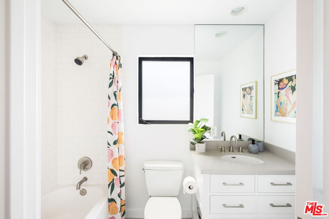 3414 Ferncroft Road Los Angeles, CA 90039 - Photo 28 of 47 a bathroom with a sink mirror vanity and toilet