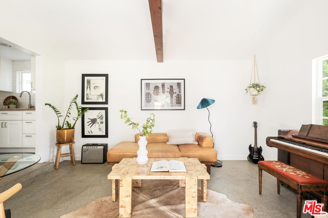 3414 Ferncroft Road Los Angeles, CA 90039 - Photo 35 of 47 a living room with furniture a rug and white walls