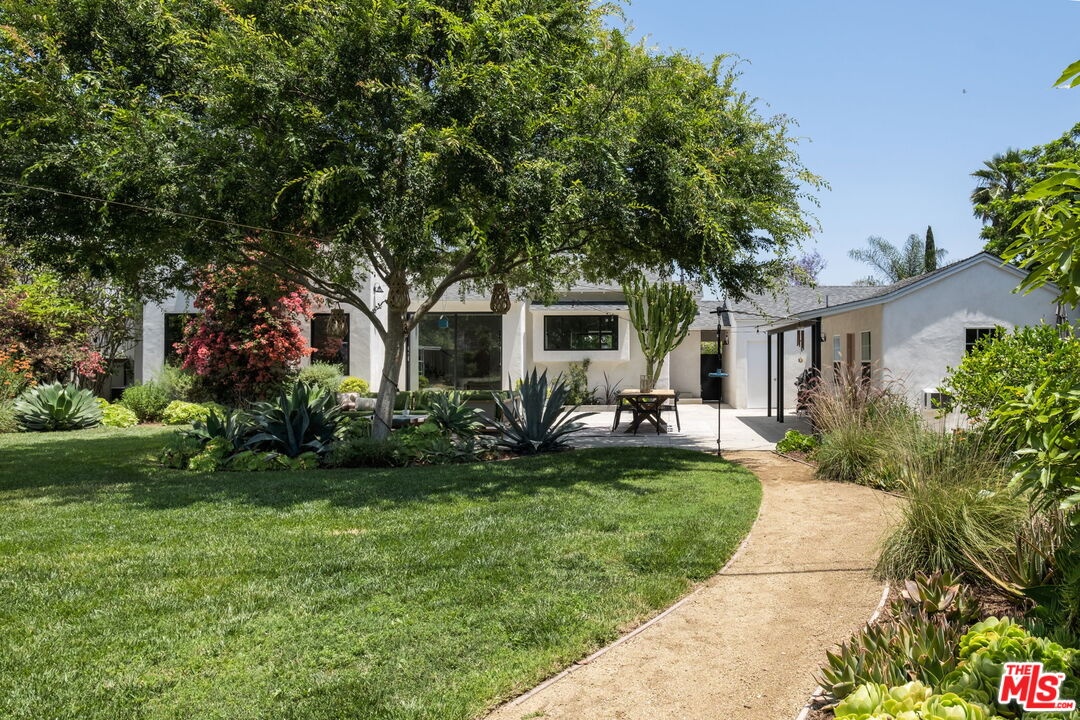 3414 Ferncroft Road Los Angeles, CA 90039 - Photo 46 of 47 a front view of a house with a garden and patio