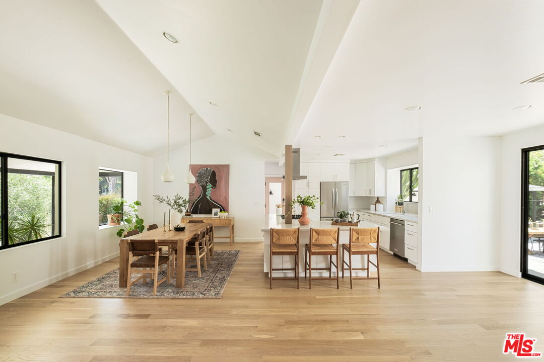 3414 Ferncroft Road Los Angeles, CA 90039 - Photo 9 of 47 a view of a dining room with furniture window and wooden floor