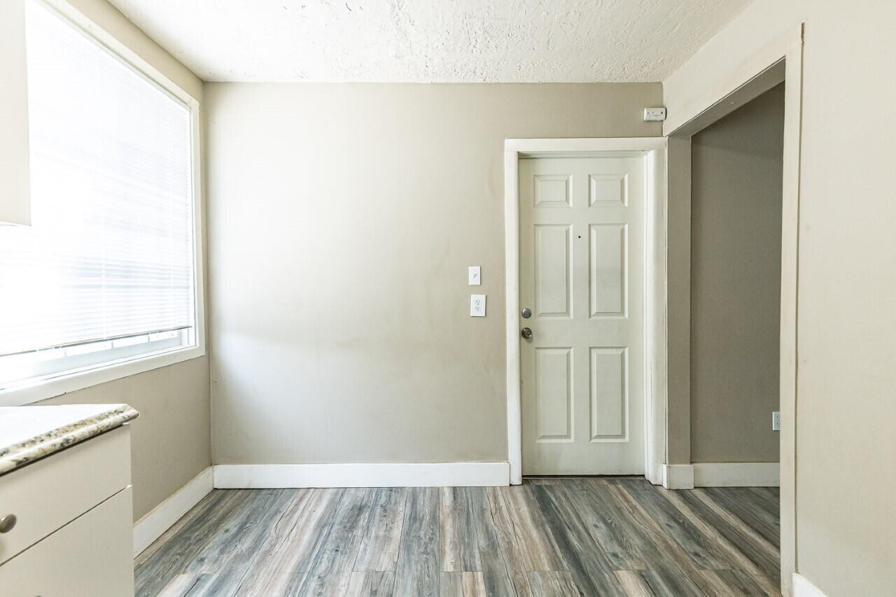 2311 25th Street Lubbock, TX 79411 - Photo 10 of 14 a view of a room with wooden floor