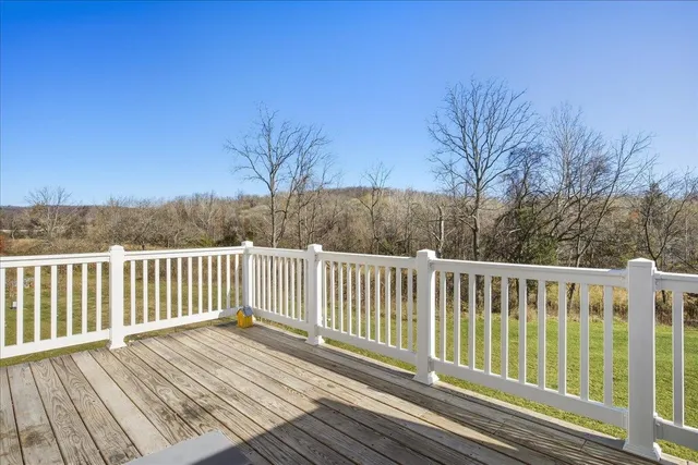a view of a wooden roof deck