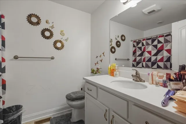 a bathroom with a sink and a toilet