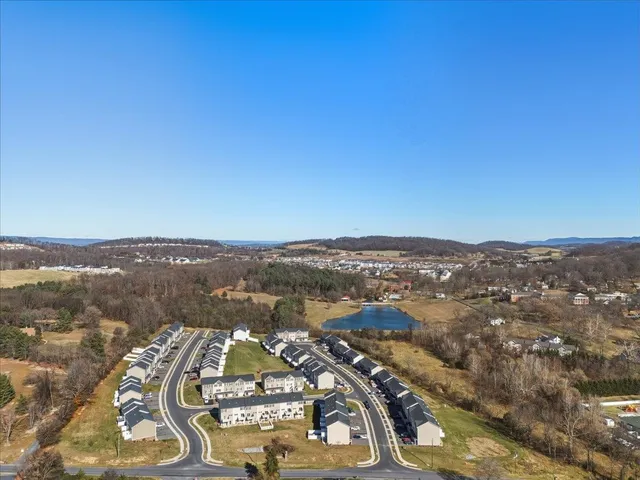an aerial view of residential building and lake view