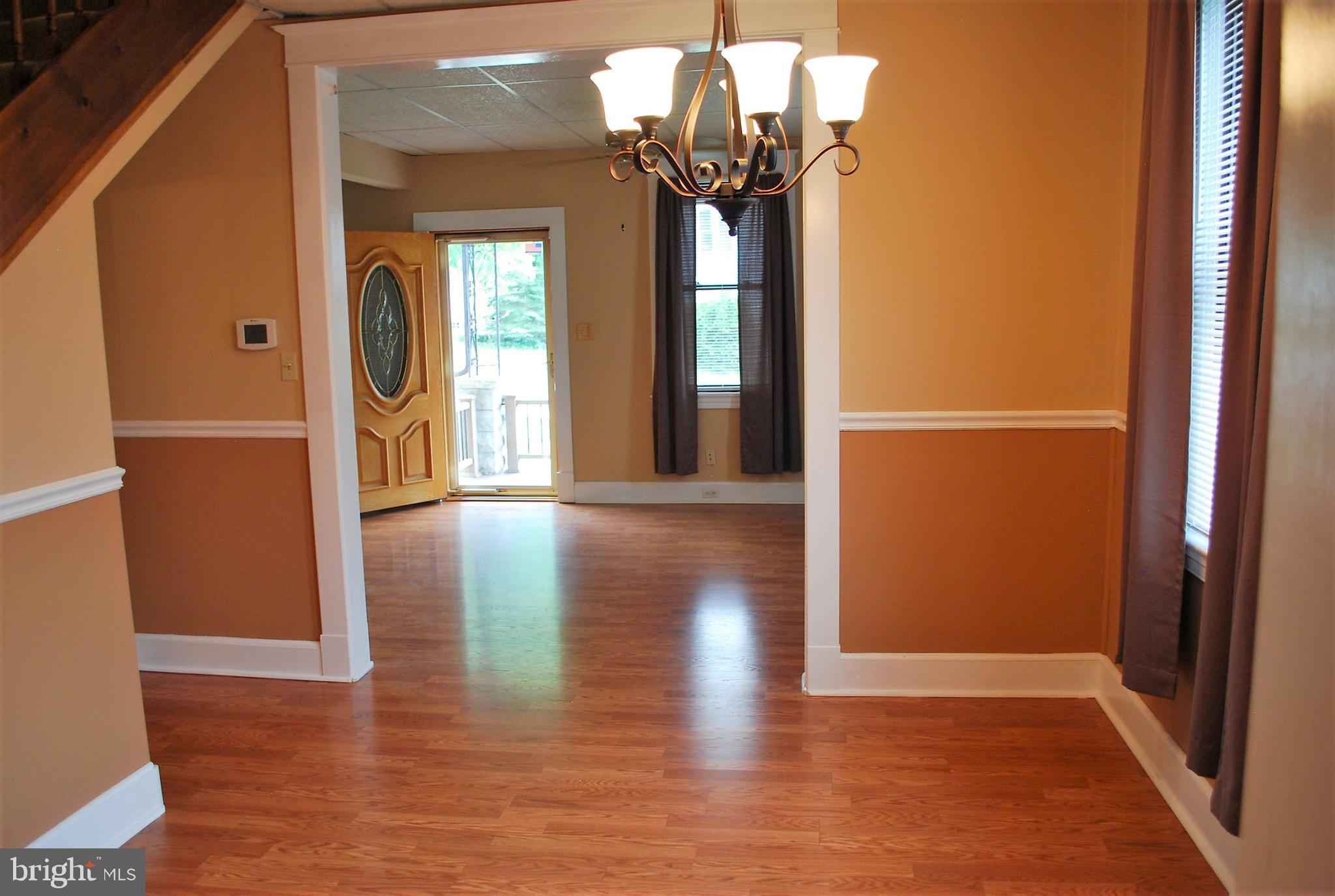 4333 Ridge Avenue Baltimore, MD 21227 - Photo 5 of 35 Dining area view of front door
