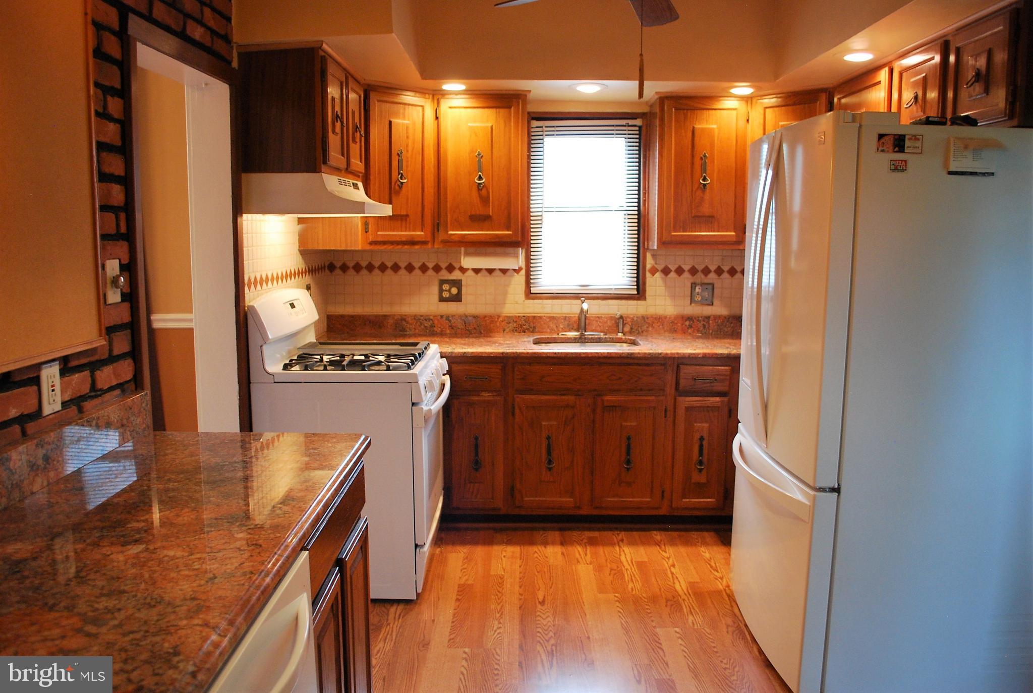 4333 Ridge Avenue Baltimore, MD 21227 - Photo 8 of 35 More kitchen w newer over-sized refrigerator
