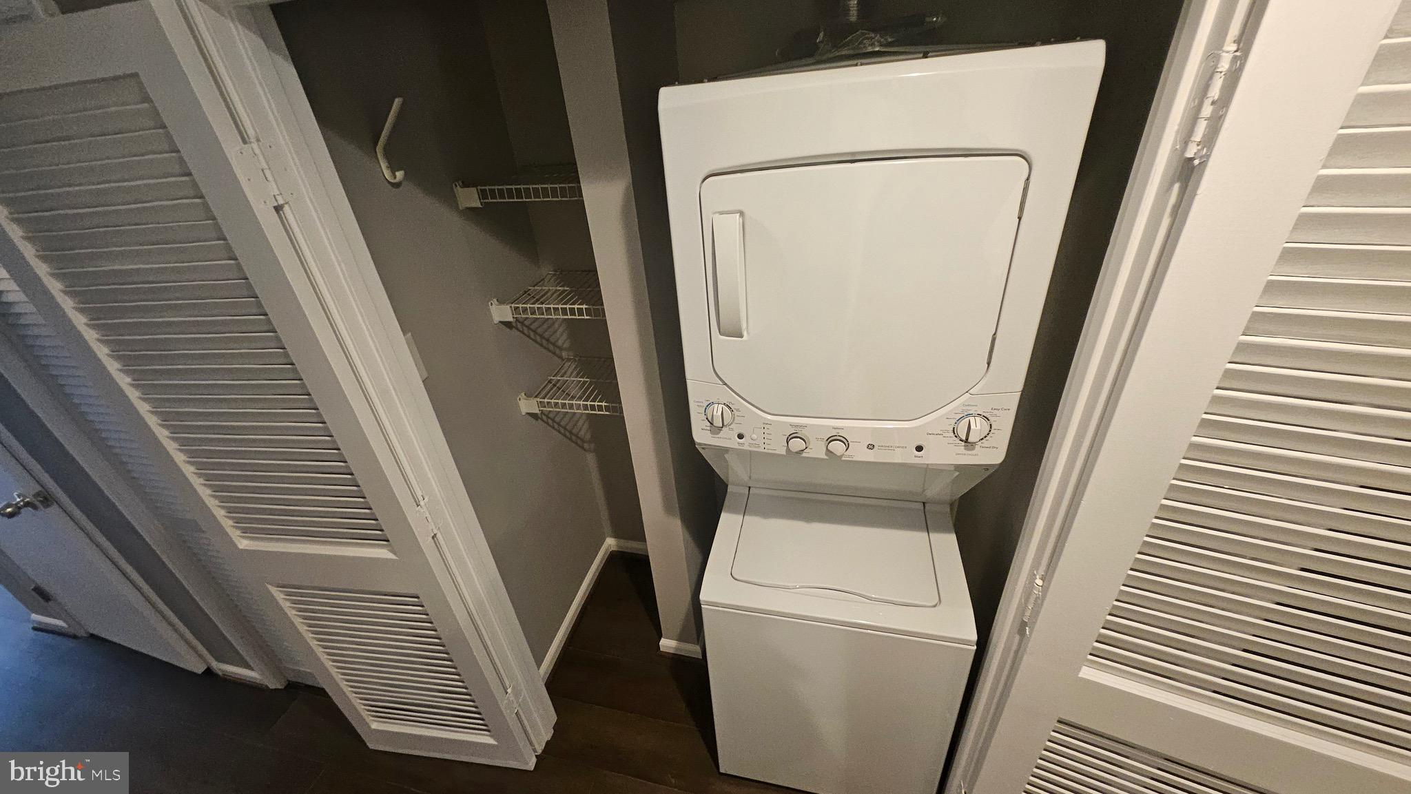 14224 Jib Street, Unit 6142 Laurel, MD 20707 - Photo 5 of 15 a utility room with dryer and washer