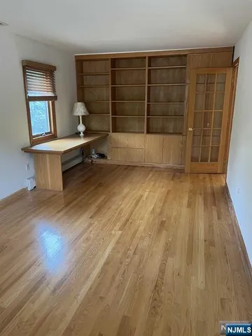 wooden floor and bench in a room