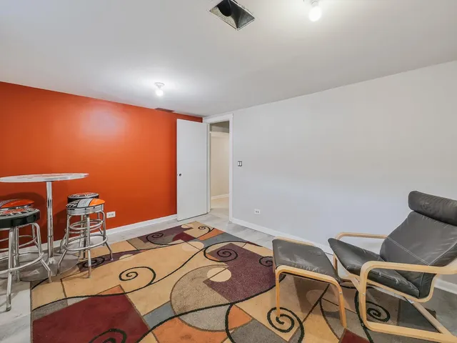 a workspace with furniture and wooden floor