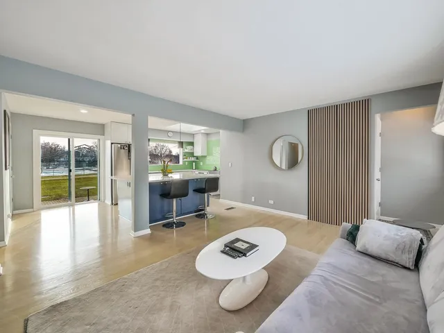 a living room with furniture and a table