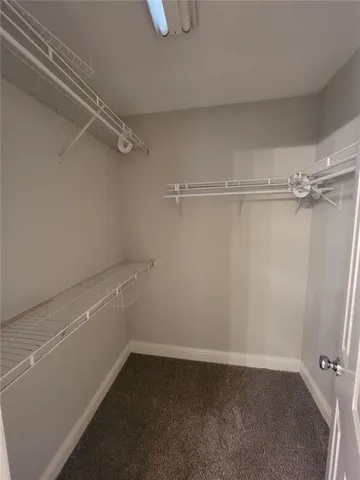 a bathroom with a sink a mirror and a vanity