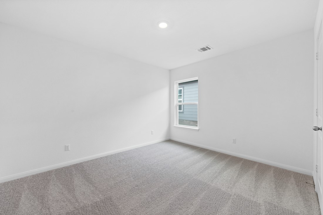 208 Morrison Drive Jarrell, TX 76537 - Photo 6 of 11 a view of an empty room with a window