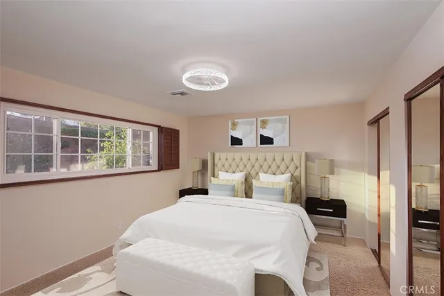 a view of a living room and a floor to ceiling window