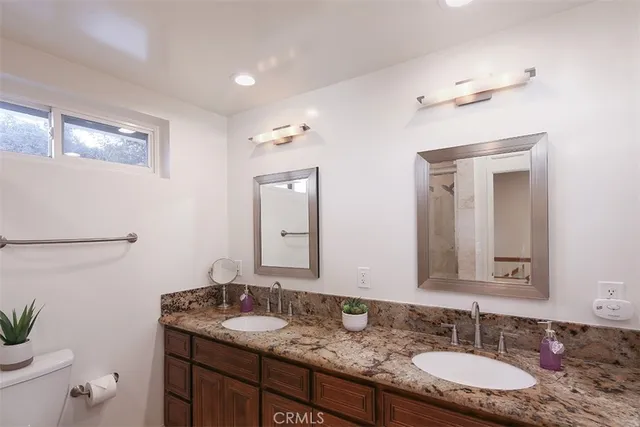 a view of a patio with a table chairs and a table