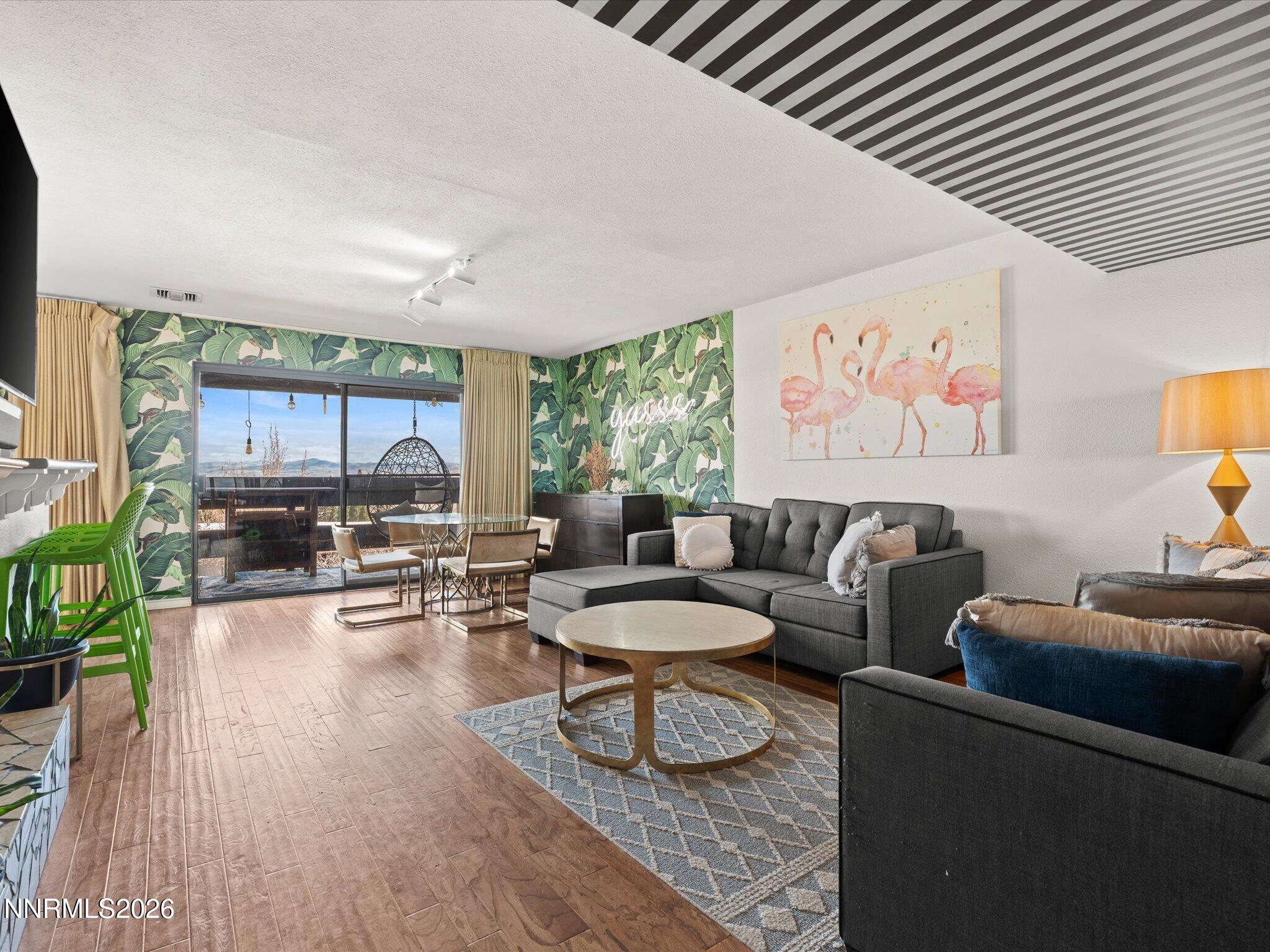 3149 Cashill Boulevard Reno, NV 89509 - Photo 12 of 44 a living room with furniture and a large window