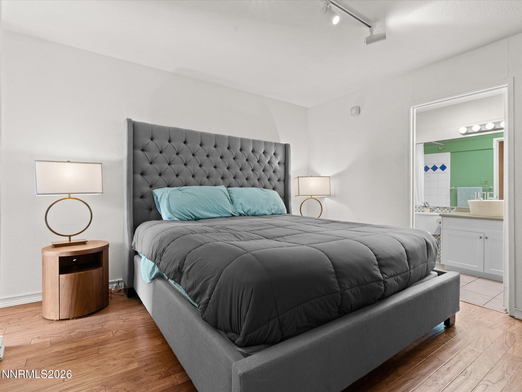 3149 Cashill Boulevard Reno, NV 89509 - Photo 28 of 44 a bedroom with a bed and window