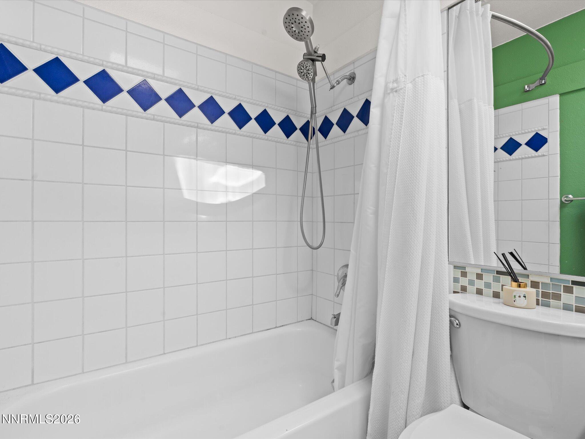 3149 Cashill Boulevard Reno, NV 89509 - Photo 32 of 44 a bathroom with a sink and a shower