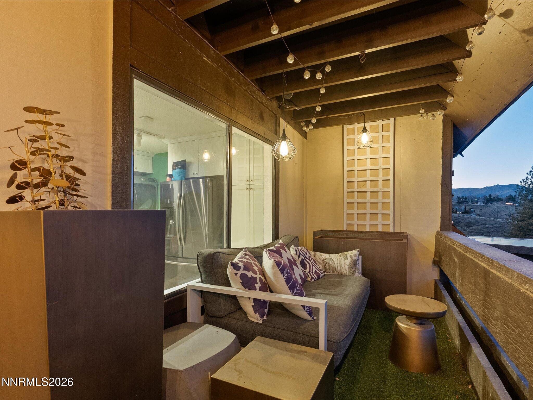 3149 Cashill Boulevard Reno, NV 89509 - Photo 38 of 44 a living room with furniture and a flat screen tv