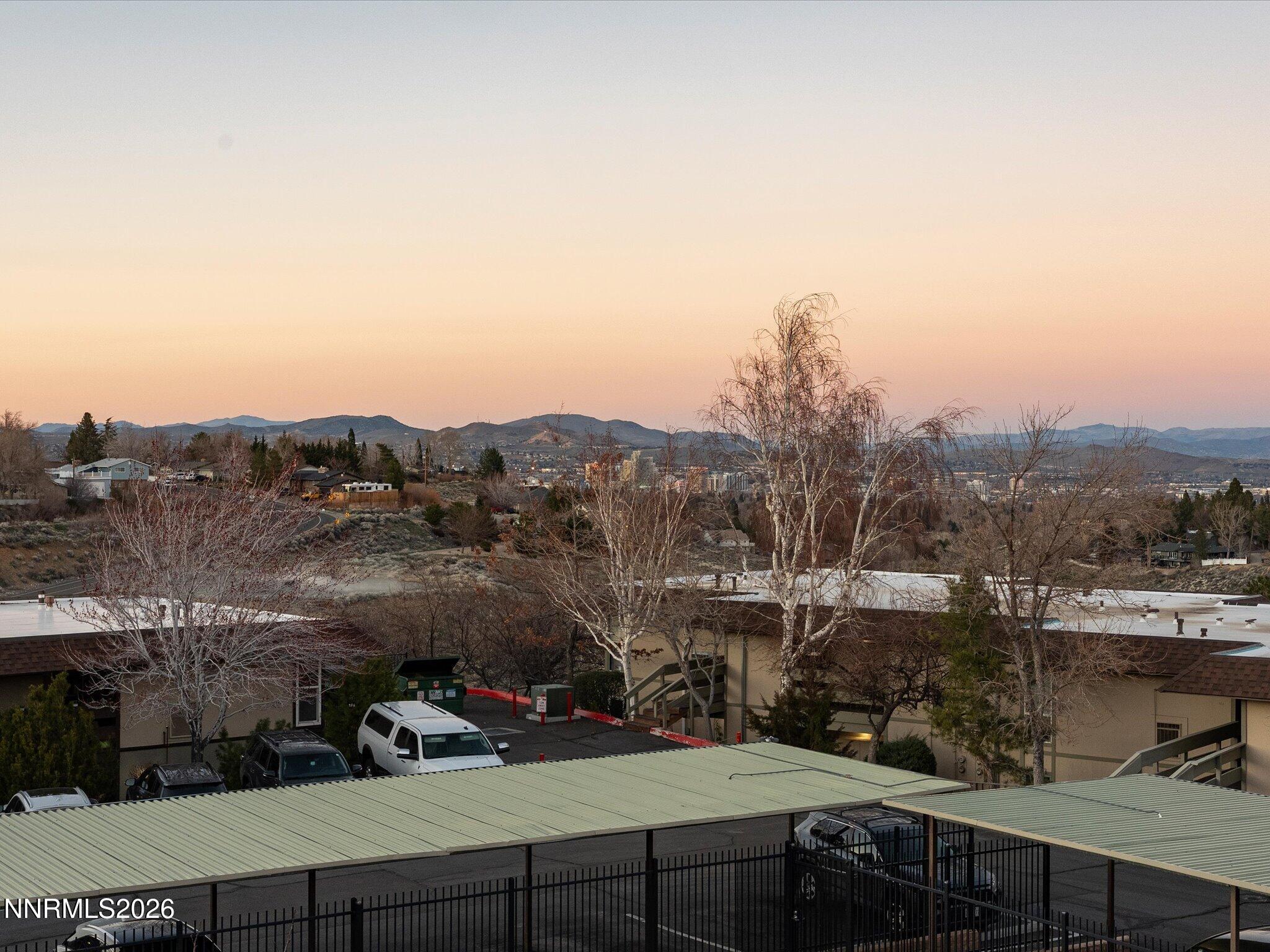 3149 Cashill Boulevard Reno, NV 89509 - Photo 4 of 44 a view of a street with a mountain view