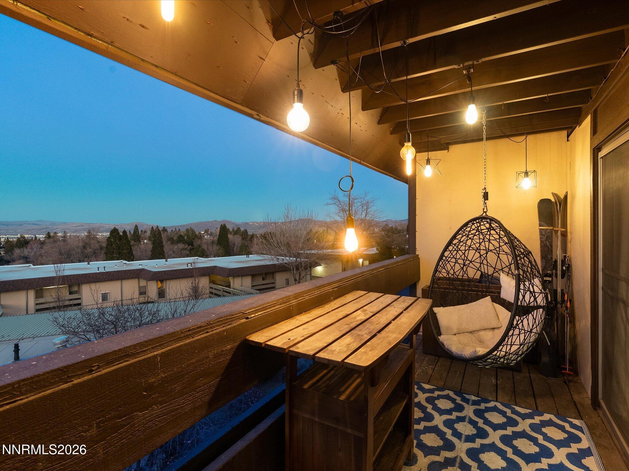 3149 Cashill Boulevard Reno, NV 89509 - Photo 7 of 44 a balcony with wooden floor