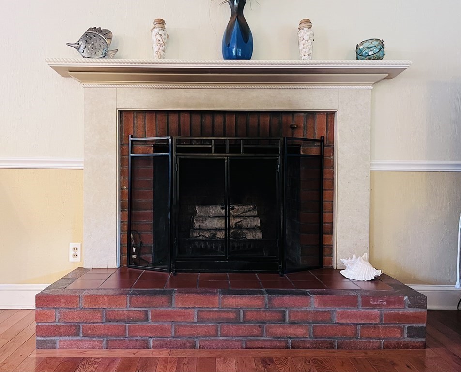 3 Windmill Road Bourne, MA 02532 - Photo 19 of 42 a view of fireplace and living room