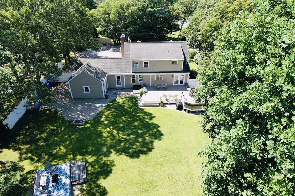 3 Windmill Road Bourne, MA 02532 - Photo 2 of 42 an aerial view of residential house with outdoor space and trees all around