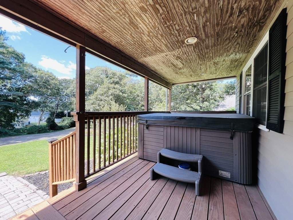 3 Windmill Road Bourne, MA 02532 - Photo 22 of 42 a view of a wooden deck with furniture