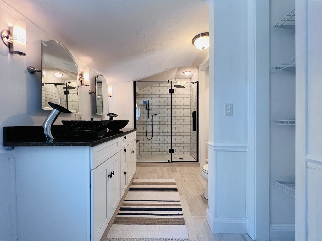 3 Windmill Road Bourne, MA 02532 - Photo 29 of 42 a kitchen with a refrigerator and countertop