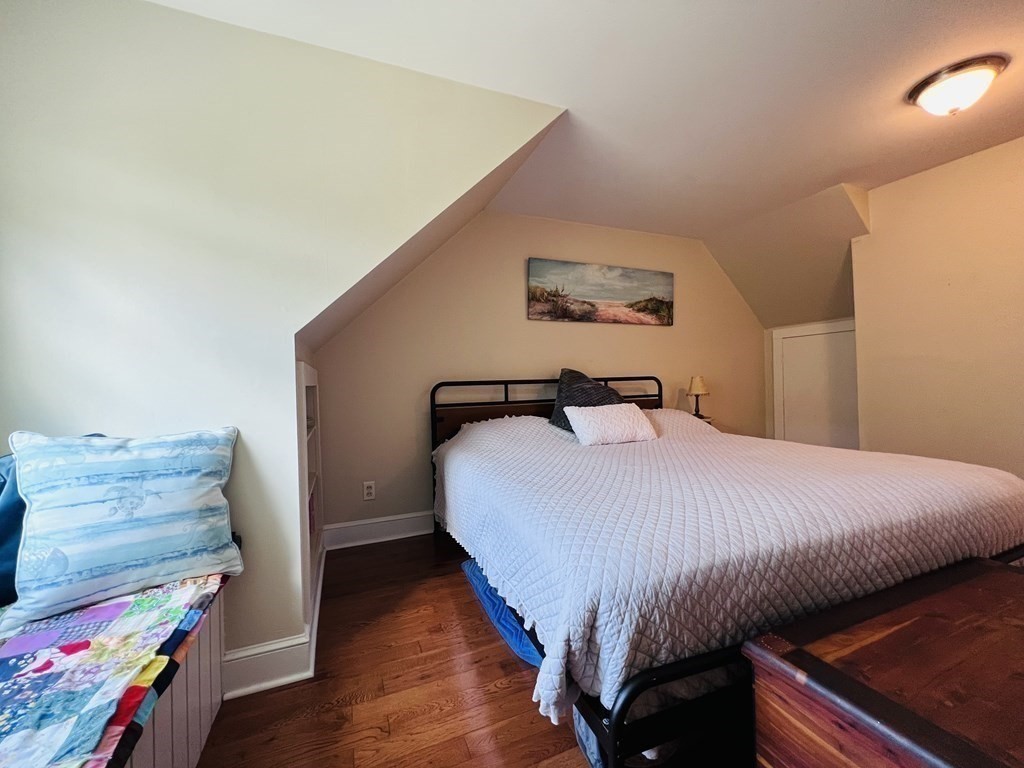 3 Windmill Road Bourne, MA 02532 - Photo 34 of 42 a bedroom with a bed and a dresser