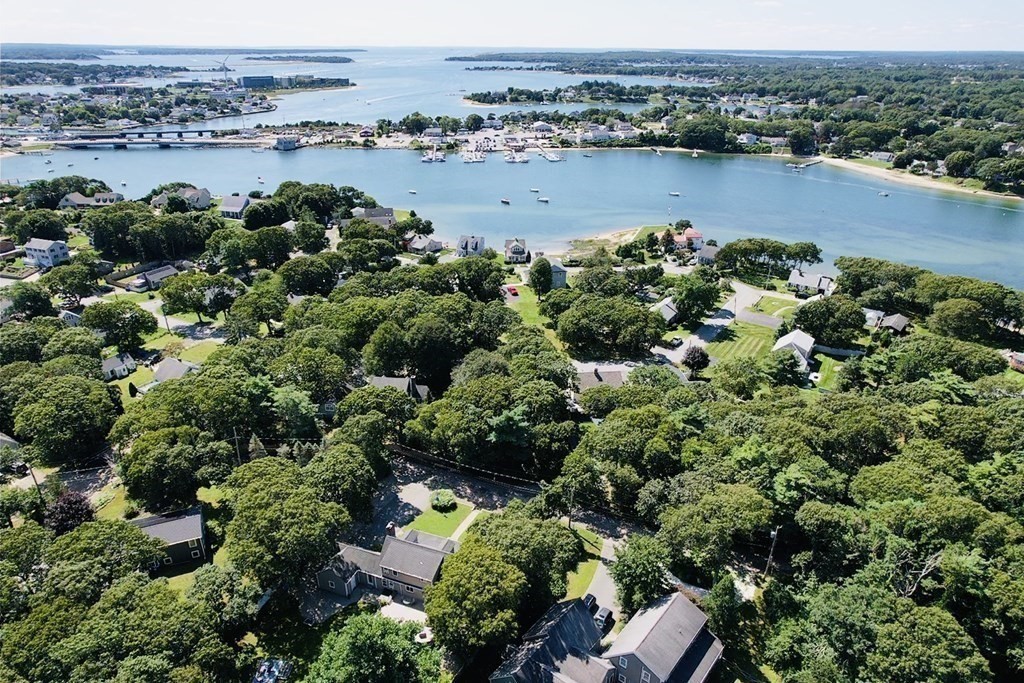 3 Windmill Road Bourne, MA 02532 - Photo 38 of 42 an aerial view of a houses with a lake view