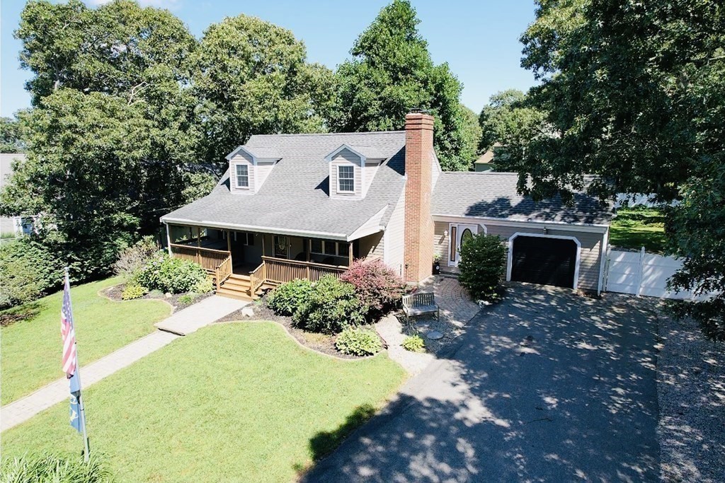 3 Windmill Road Bourne, MA 02532 - Photo 39 of 42 a front view of a house with a yard